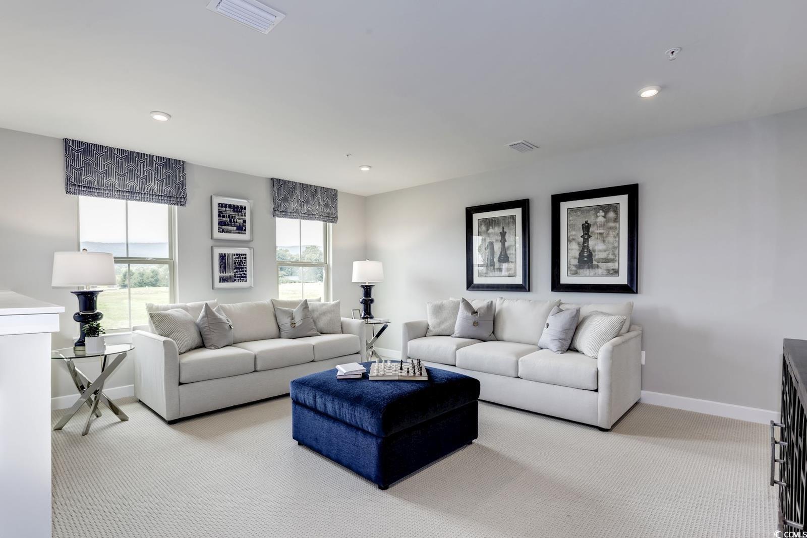 2352 Hazel Way Longs, SC 29568 - Photo 12 of 14 Carpeted living room with recessed lighting