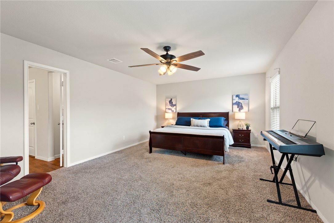 2018 Eagle View Drive Navasota, TX 77868 - Photo 14 of 28 a bedroom with furniture and a bed