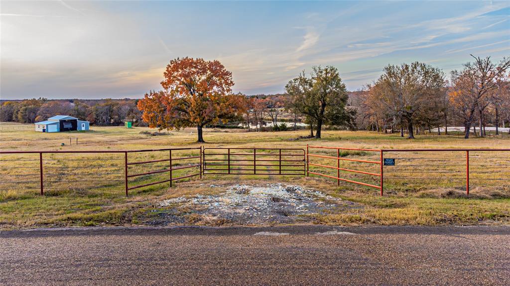 9244 County Road 1200 Athens, TX 75751 - Photo 2 of 12 a view of a yard and an ocean view