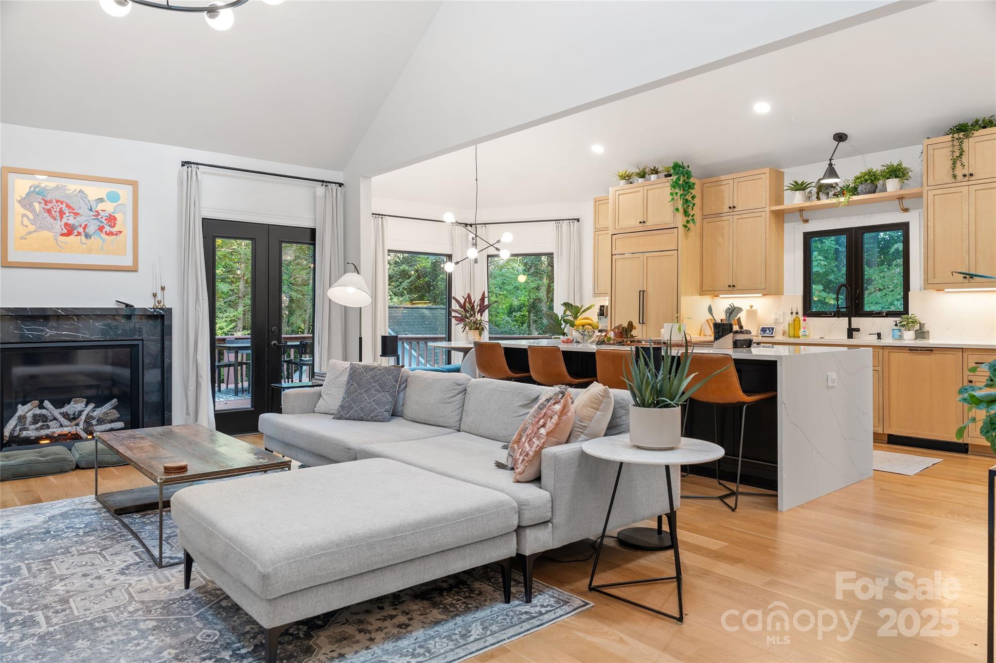 5123 Randolph Road Charlotte, NC 28211 - Photo 1 of 30 a living room with furniture large window and a fireplace