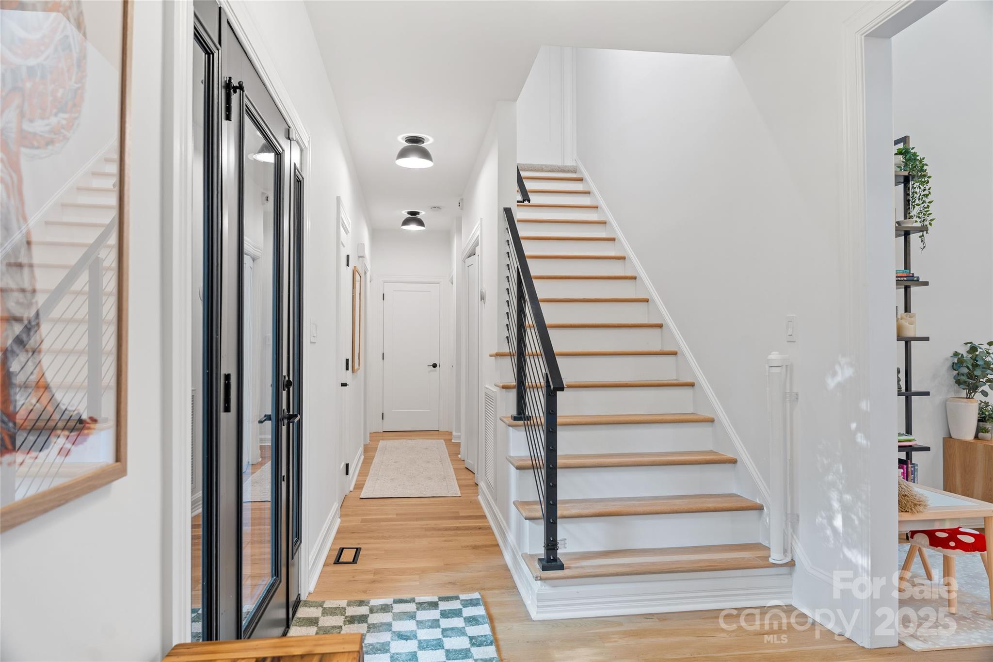 5123 Randolph Road Charlotte, NC 28211 - Photo 15 of 30 a view of a hallway with wooden floor and entryway
