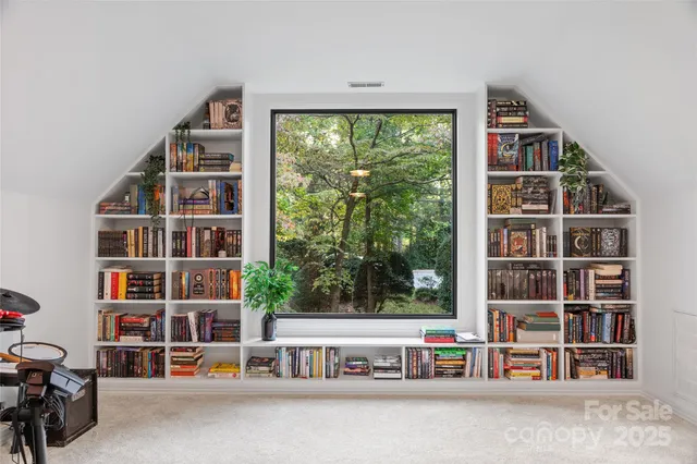 a view of a livingroom with furniture and a couch