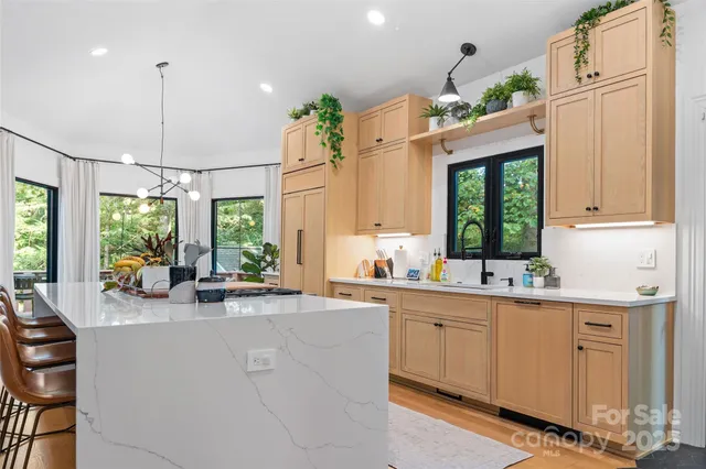 a view of a kitchen with furniture and window