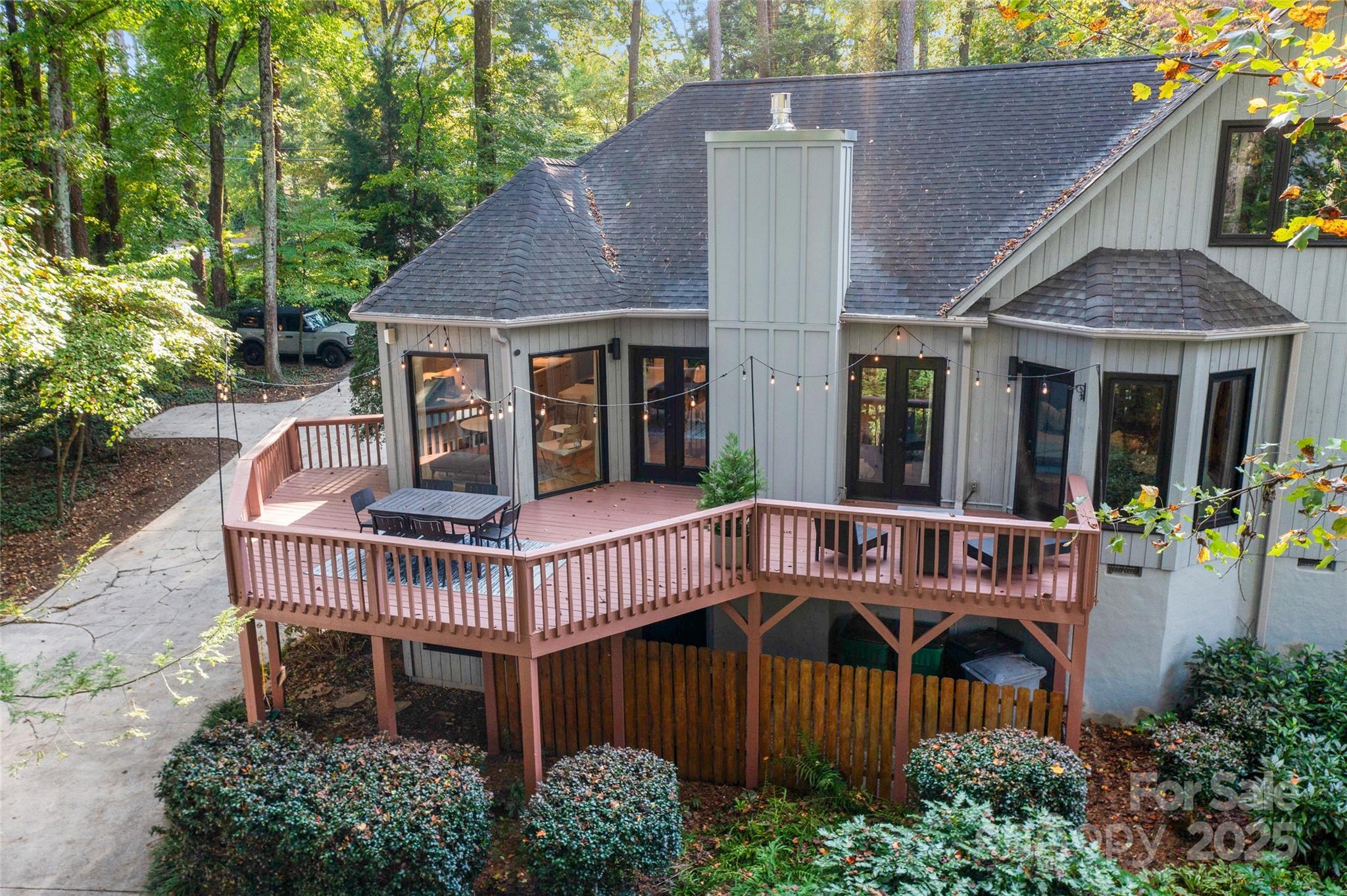 5123 Randolph Road Charlotte, NC 28211 - Photo 25 of 30 a view of a house with a deck and furniture