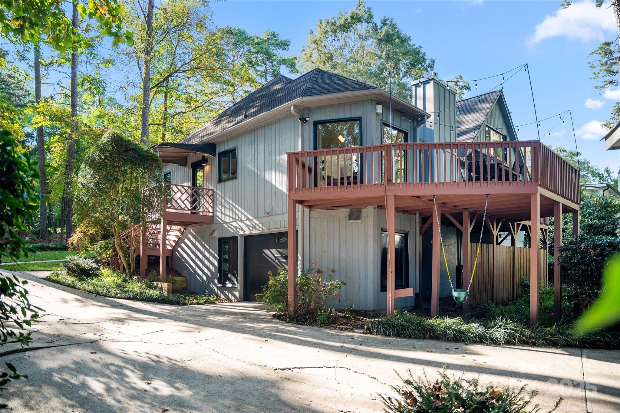 5123 Randolph Road Charlotte, NC 28211 - Photo 26 of 30 a front view of a house with a yard