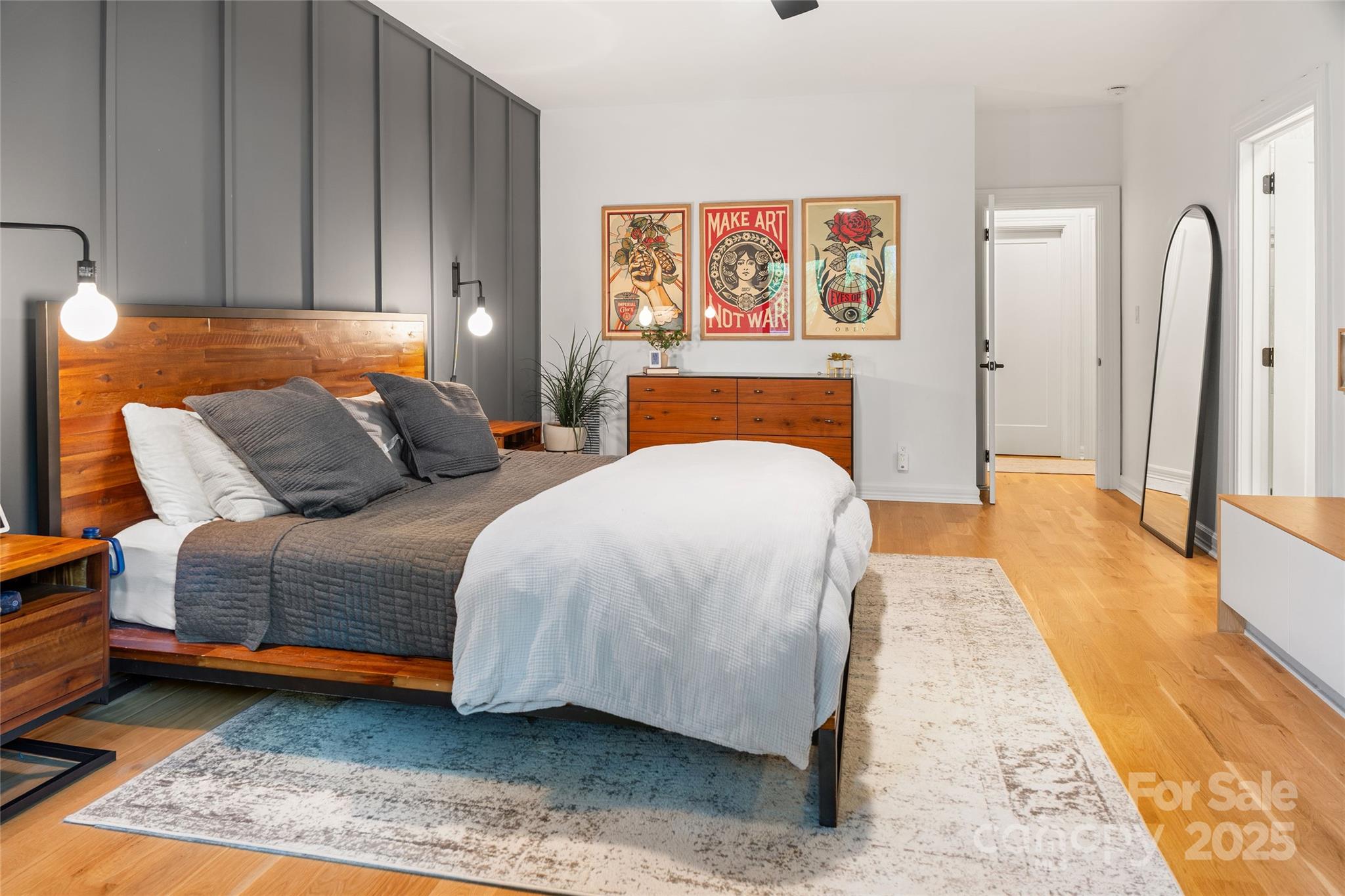 5123 Randolph Road Charlotte, NC 28211 - Photo 10 of 30 a bedroom with a bed and painting on the wall