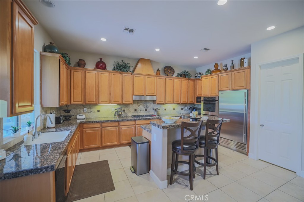 17 Bellisimo Court Rancho Mirage, CA 92270 - Photo 12 of 42 Kitchen, coffee bar with butler pantry on the right
