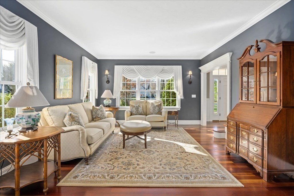 9 Laurel Ridge Lane Shrewsbury, MA 01545 - Photo 11 of 41 a living room with furniture and a large window