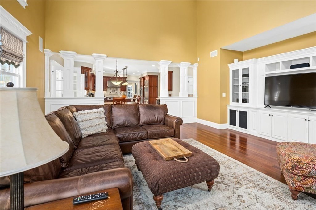 9 Laurel Ridge Lane Shrewsbury, MA 01545 - Photo 14 of 41 a living room with furniture and a flat screen tv