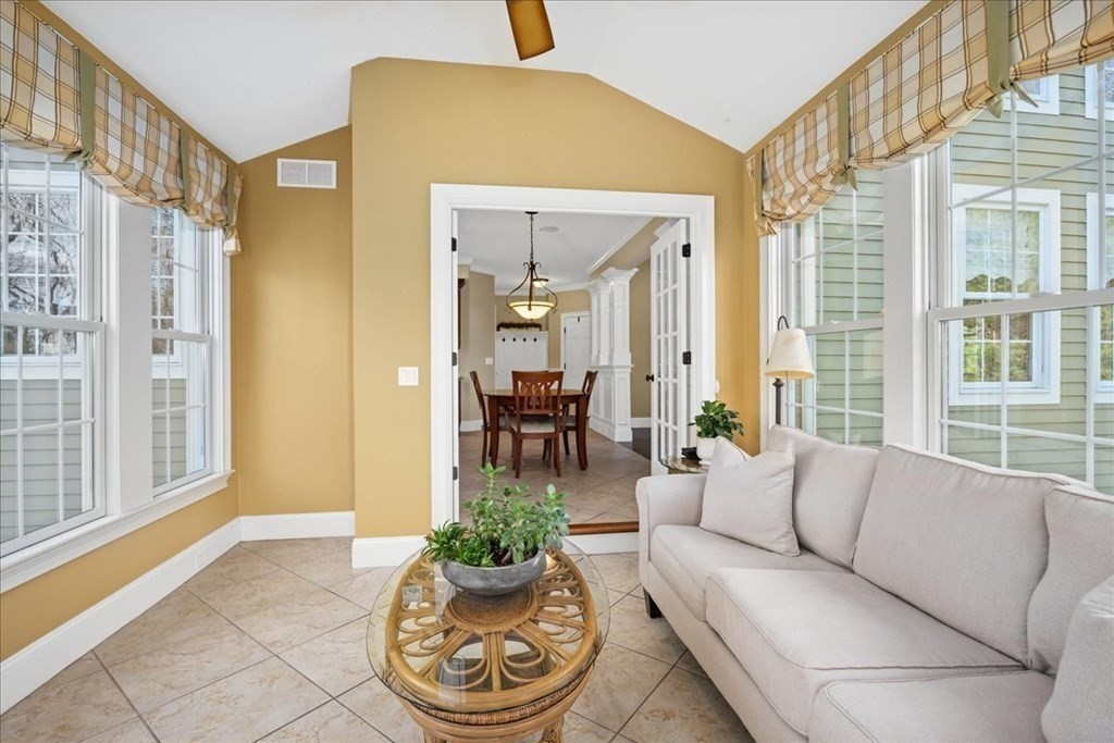 9 Laurel Ridge Lane Shrewsbury, MA 01545 - Photo 16 of 41 a living room with furniture and a potted plant