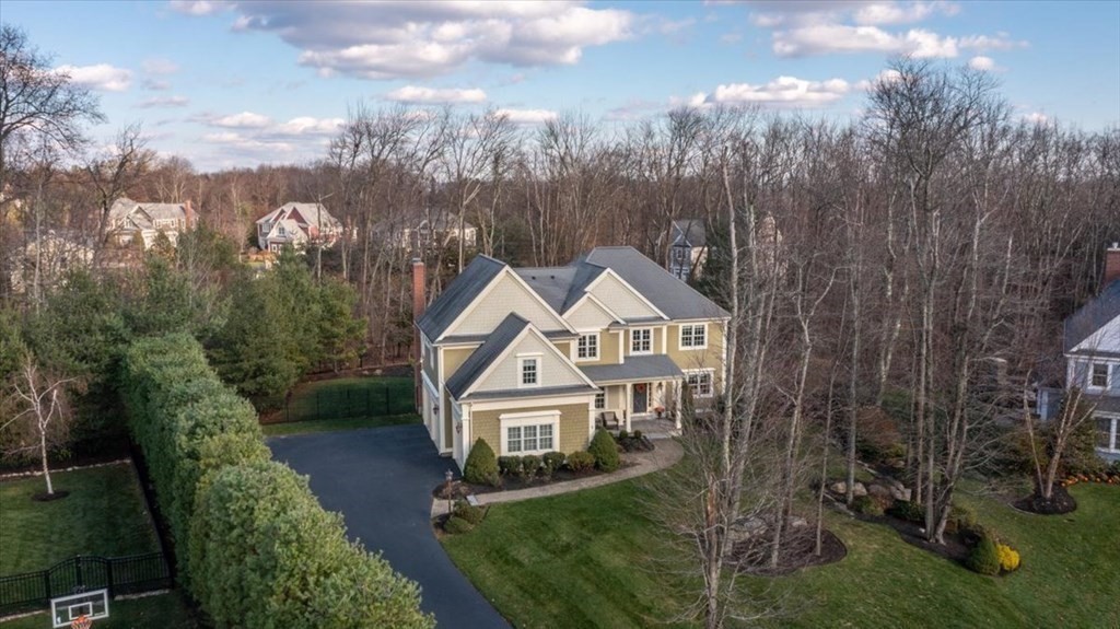 9 Laurel Ridge Lane Shrewsbury, MA 01545 - Photo 2 of 41 a front view of a house with garden