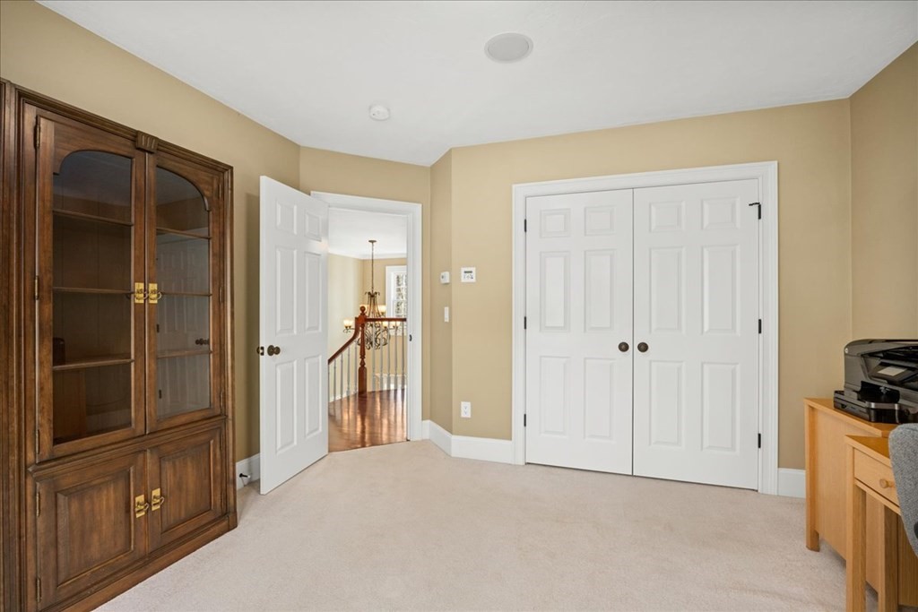 9 Laurel Ridge Lane Shrewsbury, MA 01545 - Photo 27 of 41 a big room with closet and wooden floor