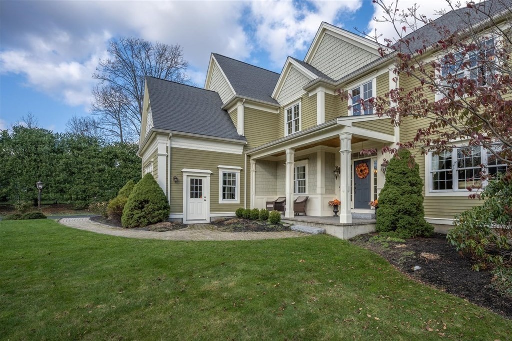 9 Laurel Ridge Lane Shrewsbury, MA 01545 - Photo 3 of 41 front view of a house with a yard