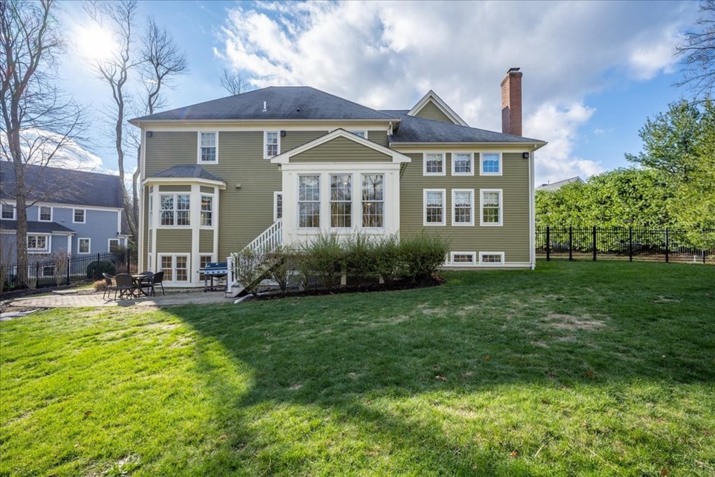 9 Laurel Ridge Lane Shrewsbury, MA 01545 - Photo 35 of 41 a front view of a house with a garden
