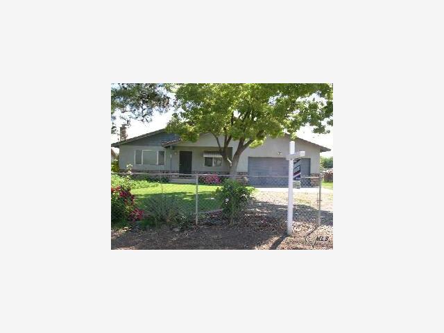 86 North Patrick Road Stockton, CA 95215 - Photo 1 of 1 a picture of a bench in front of a house