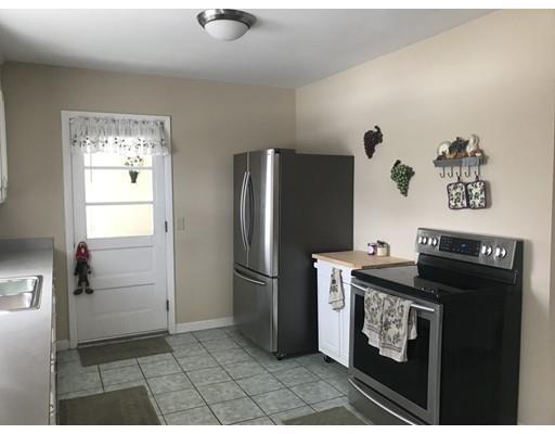 23 Inwood Road Rutland, MA 01543 - Photo 6 of 20 a kitchen with stainless steel appliances granite countertop a refrigerator a stove and a sink