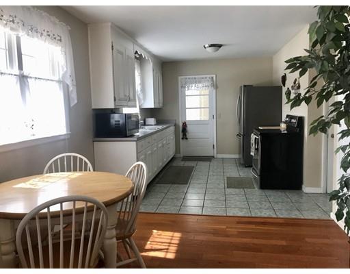 23 Inwood Road Rutland, MA 01543 - Photo 7 of 20 a kitchen with granite countertop a stove a sink and a refrigerator