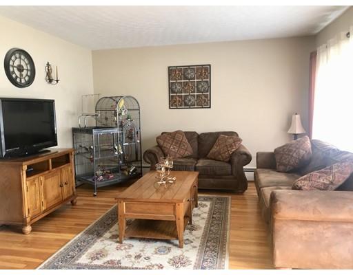 23 Inwood Road Rutland, MA 01543 - Photo 9 of 20 a living room with furniture and a flat screen tv