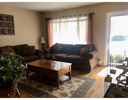 23 Inwood Road Rutland, MA 01543 - Photo 10 of 20 a living room with furniture and a large window