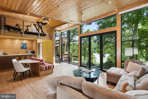 a outdoor living space with furniture and garden view