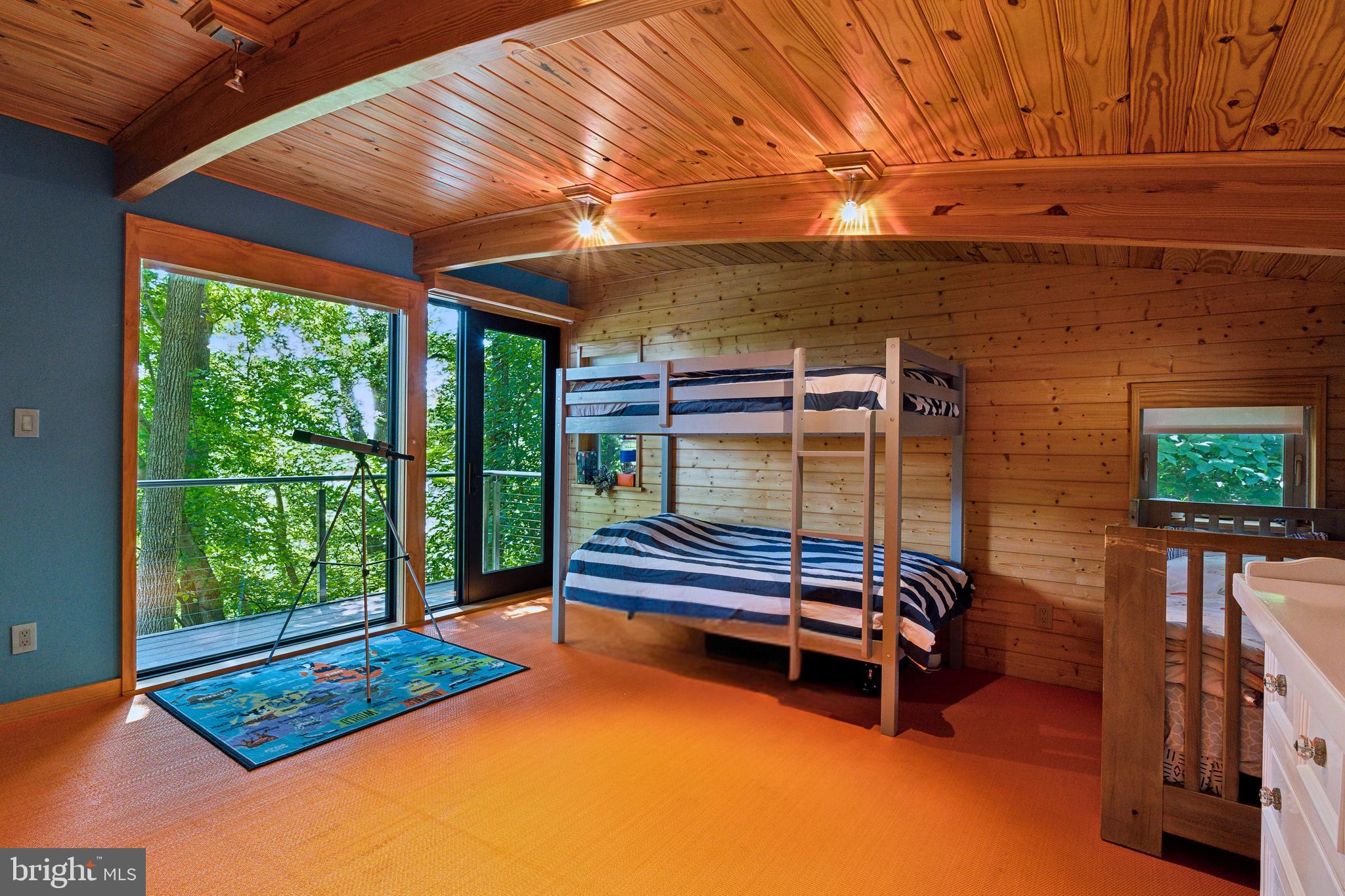 11540 Springridge Road Potomac, MD 20854 - Photo 21 of 35 a backyard of a house with barbeque oven and outdoor seating