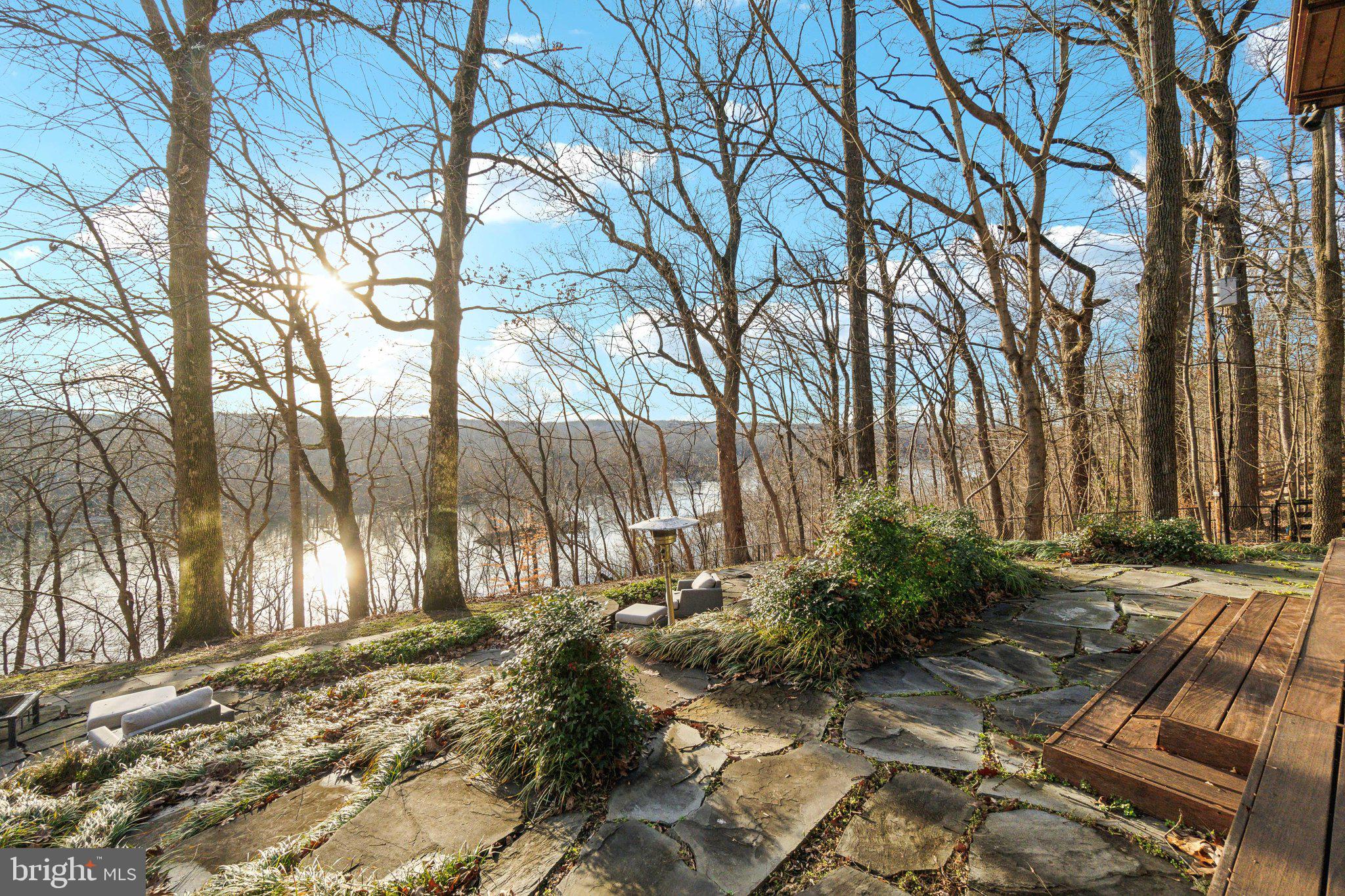 11540 Springridge Road Potomac, MD 20854 - Photo 28 of 35 a backyard of a house with lots of green space