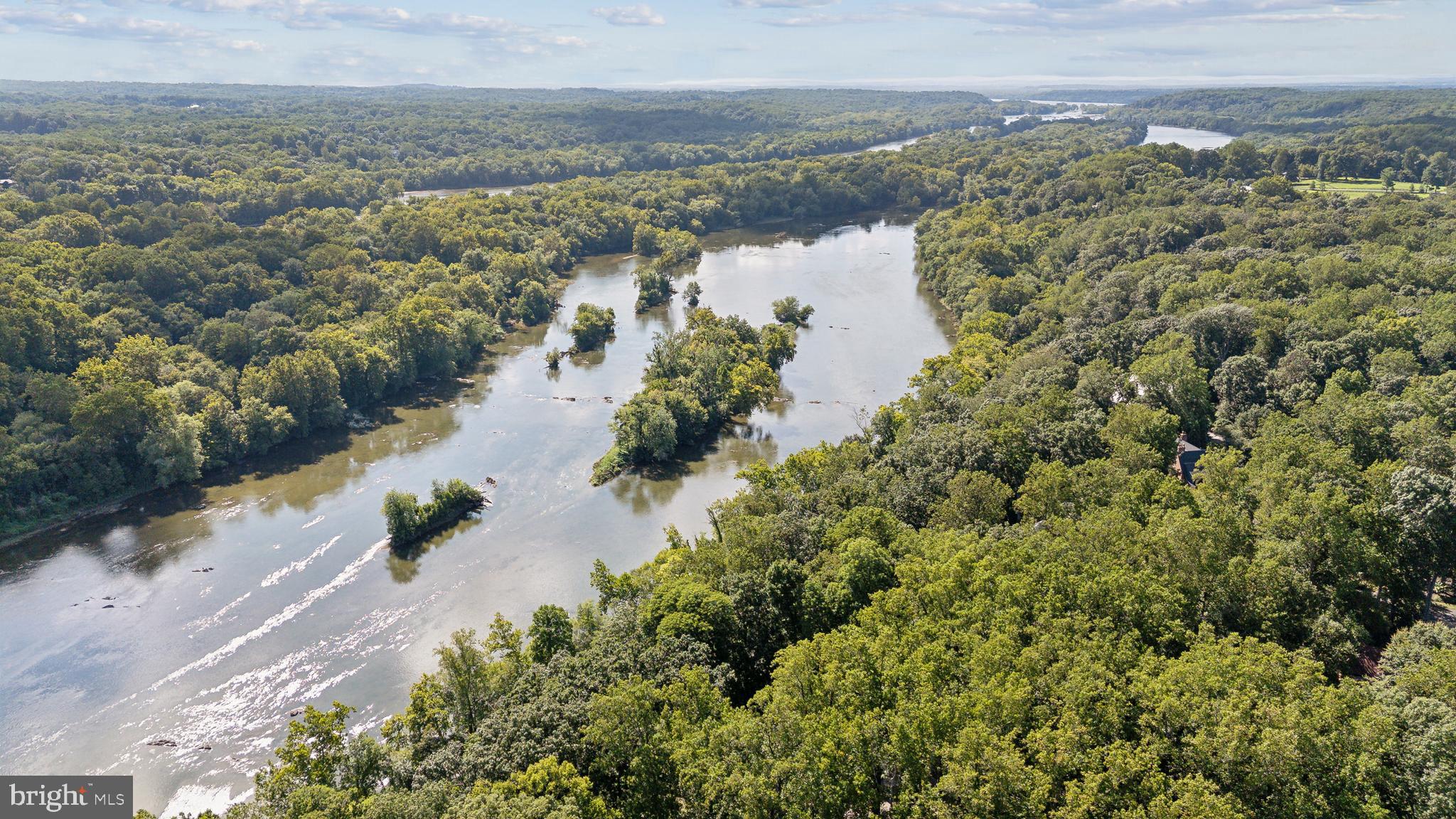 11540 Springridge Road Potomac, MD 20854 - Photo 34 of 35 a view of a lake with mountains in the background