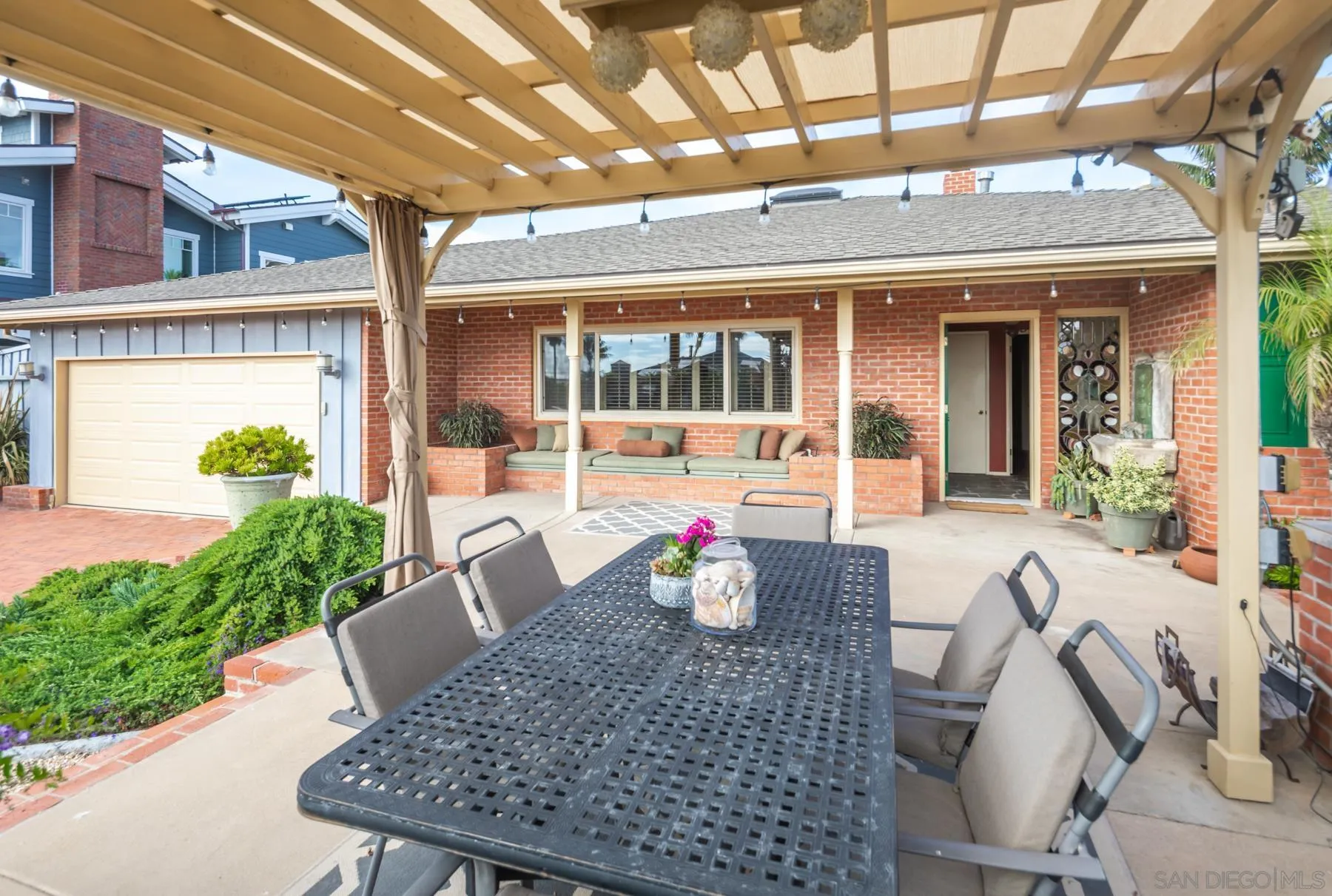 5118 Shore Drive Carlsbad, CA 92008 - Photo 4 of 21 a view of an outside dining space with furniture