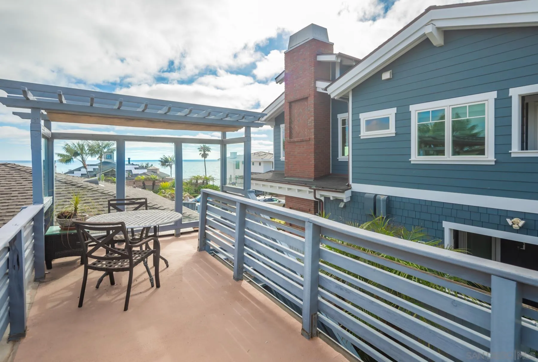 5118 Shore Drive Carlsbad, CA 92008 - Photo 5 of 21 a view of a patio with a table chairs and backyard