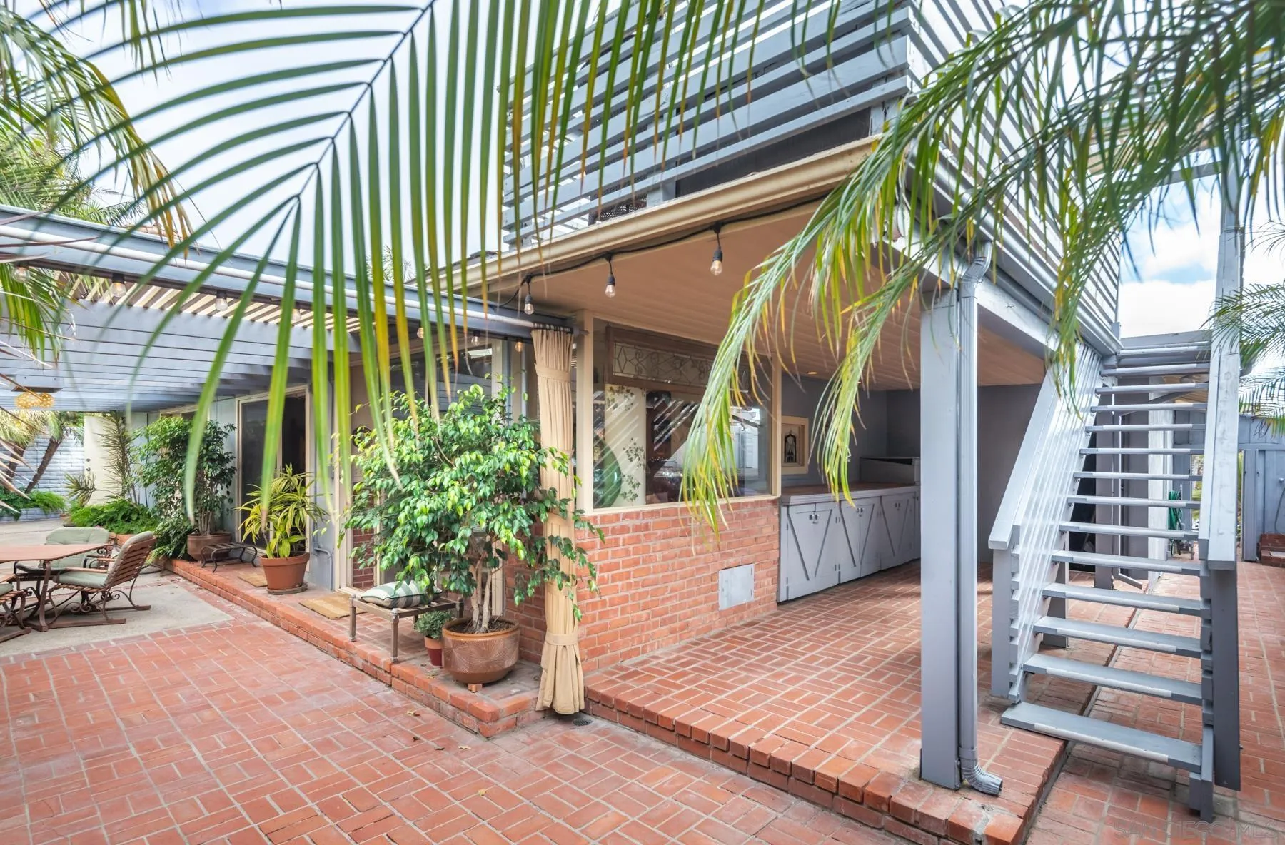5118 Shore Drive Carlsbad, CA 92008 - Photo 6 of 21 a view of a house with a patio