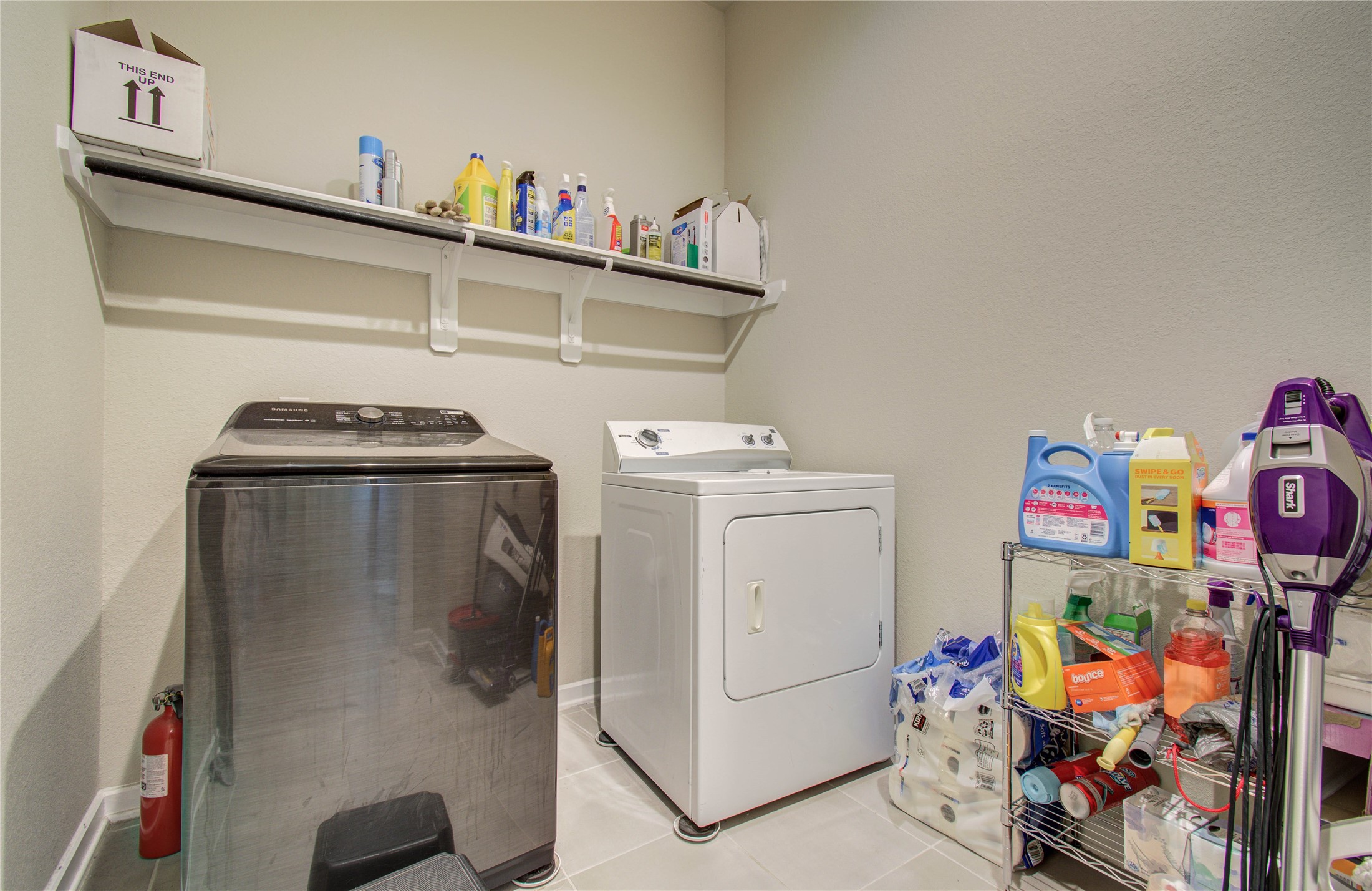 22290 Rustling Cone Court Porter, TX 77365 - Photo 14 of 30 a utility room with dryer and washer