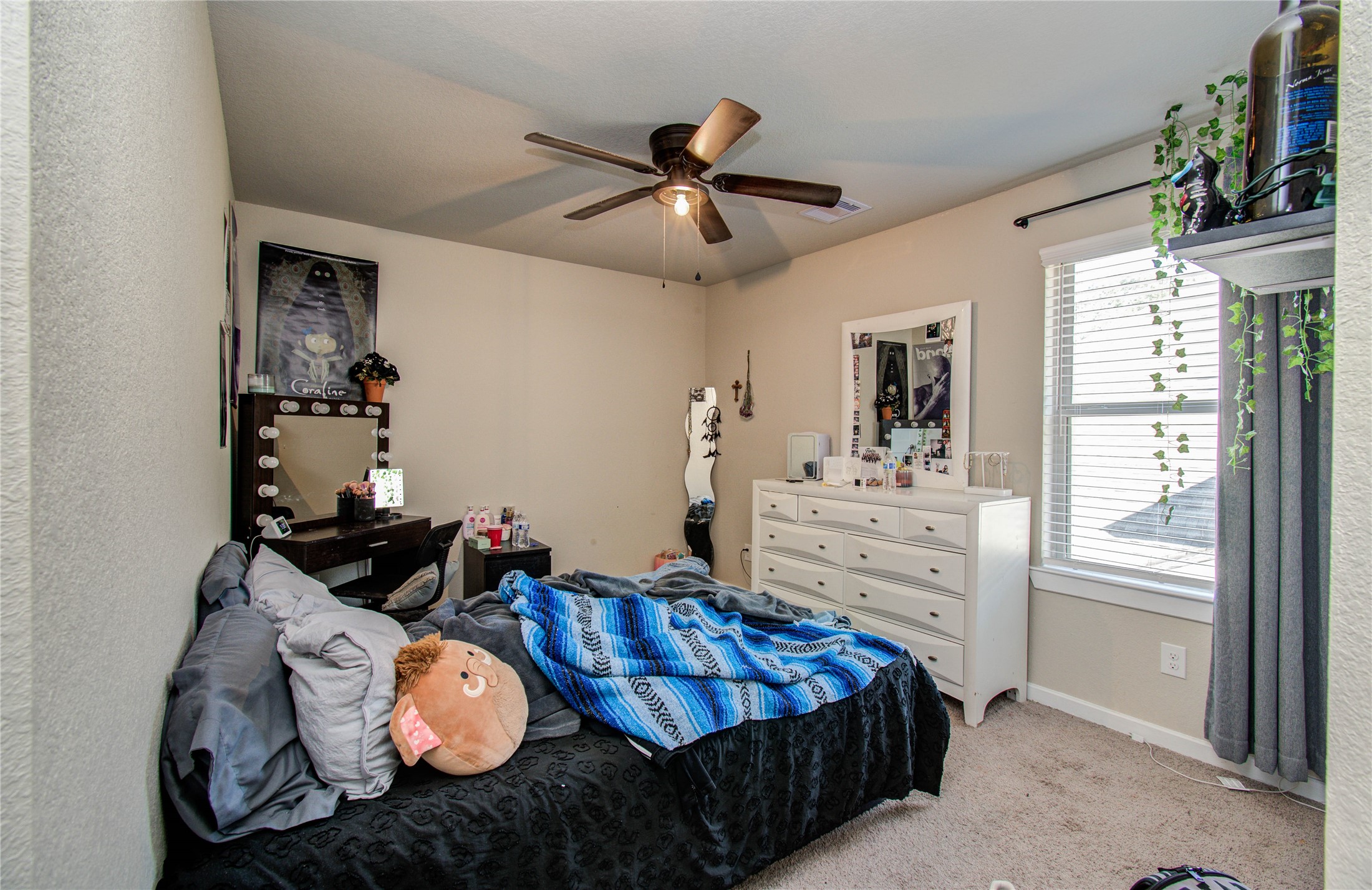 22290 Rustling Cone Court Porter, TX 77365 - Photo 24 of 30 a bedroom with bed and wooden floor
