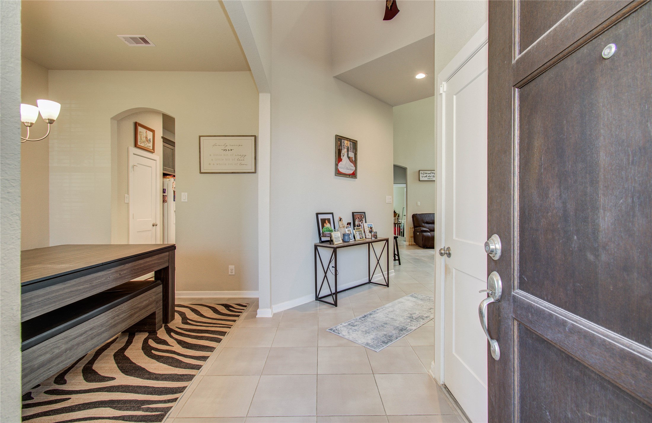 22290 Rustling Cone Court Porter, TX 77365 - Photo 3 of 30 a view of a livingroom with furniture and front door