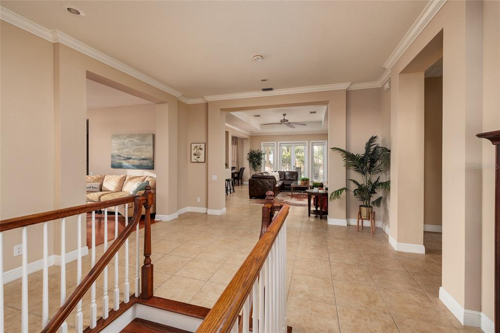 102 Wimbledon Court Redington Shores, FL 33708 - Photo 24 of 66 a view of a livingroom with furniture and hardwood floor