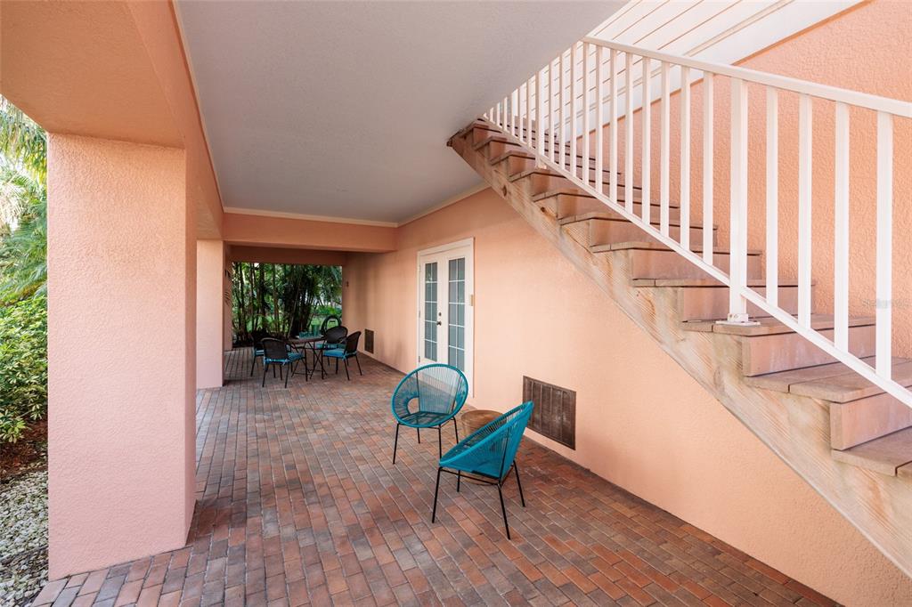 102 Wimbledon Court Redington Shores, FL 33708 - Photo 37 of 66 a view of entryway with wooden floor