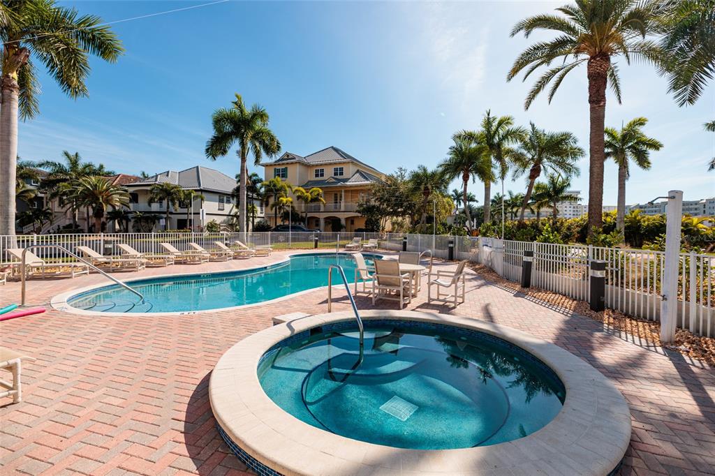 102 Wimbledon Court Redington Shores, FL 33708 - Photo 43 of 66 a view of a swimming pool with a patio