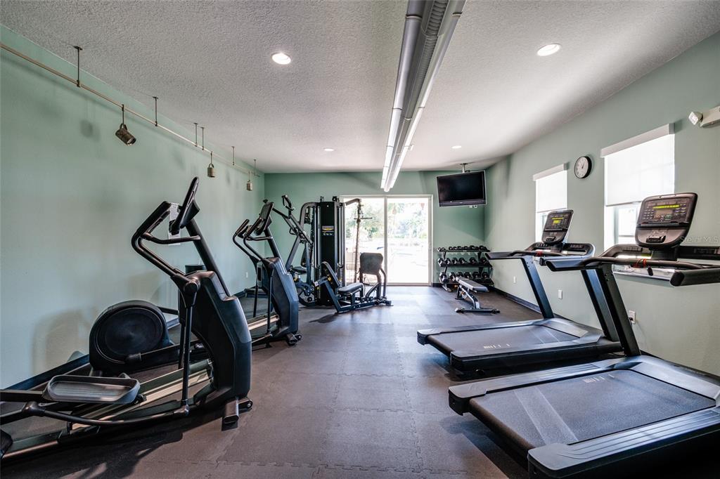 102 Wimbledon Court Redington Shores, FL 33708 - Photo 46 of 66 a view of a room with gym equipment