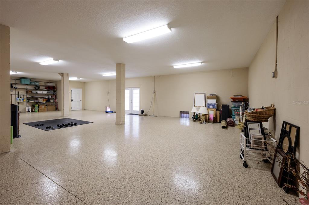 102 Wimbledon Court Redington Shores, FL 33708 - Photo 55 of 66 a view of a room with gym equipment
