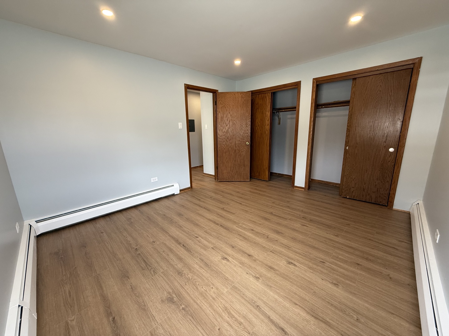 6543 16th Street, Unit 1N Berwyn, IL 60402 - Photo 9 of 11 a view of empty room with wooden floor