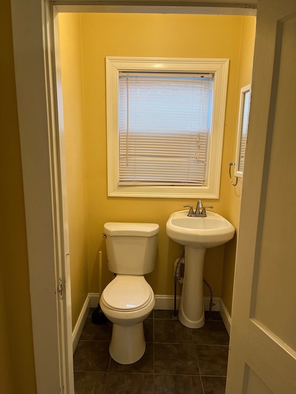 30 Stearns Road Belmont, MA 02478 - Photo 11 of 24 a bathroom with a sink toilet and mirror