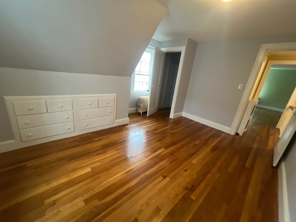 30 Stearns Road Belmont, MA 02478 - Photo 15 of 24 an empty room with wooden floor and windows