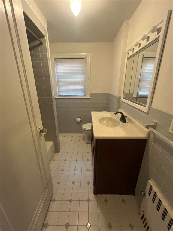 30 Stearns Road Belmont, MA 02478 - Photo 16 of 24 a bathroom with a sink and a mirror
