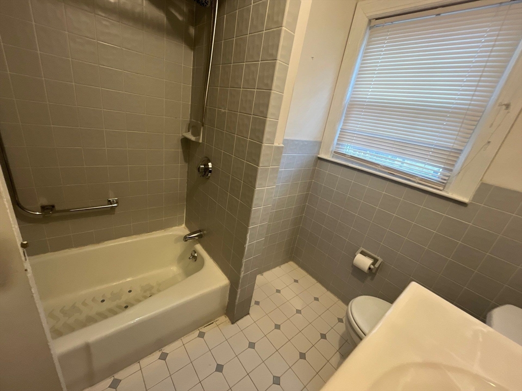30 Stearns Road Belmont, MA 02478 - Photo 17 of 24 a bathroom with a bathtub and shower