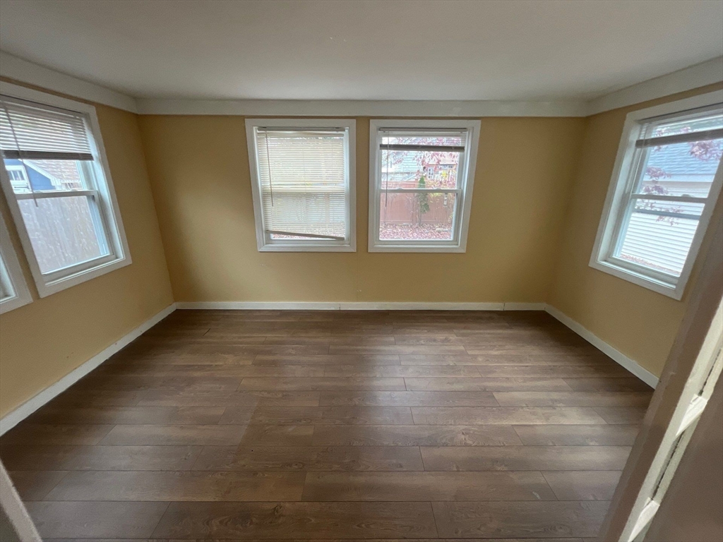 30 Stearns Road Belmont, MA 02478 - Photo 4 of 24 an empty room with windows