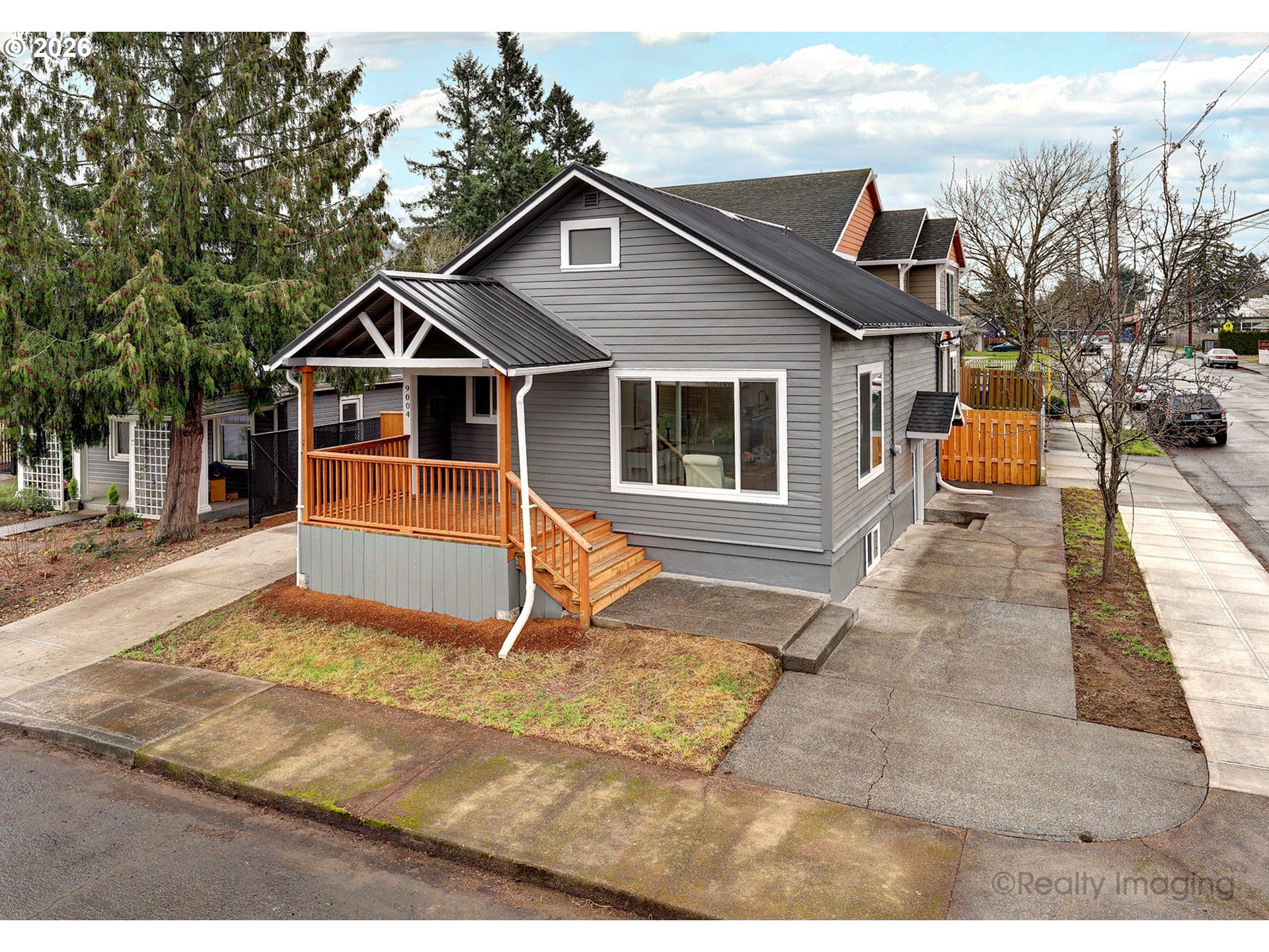 9004 Southeast Claybourne Street Portland, OR 97266 - Photo 1 of 15 a view of a house with backyard