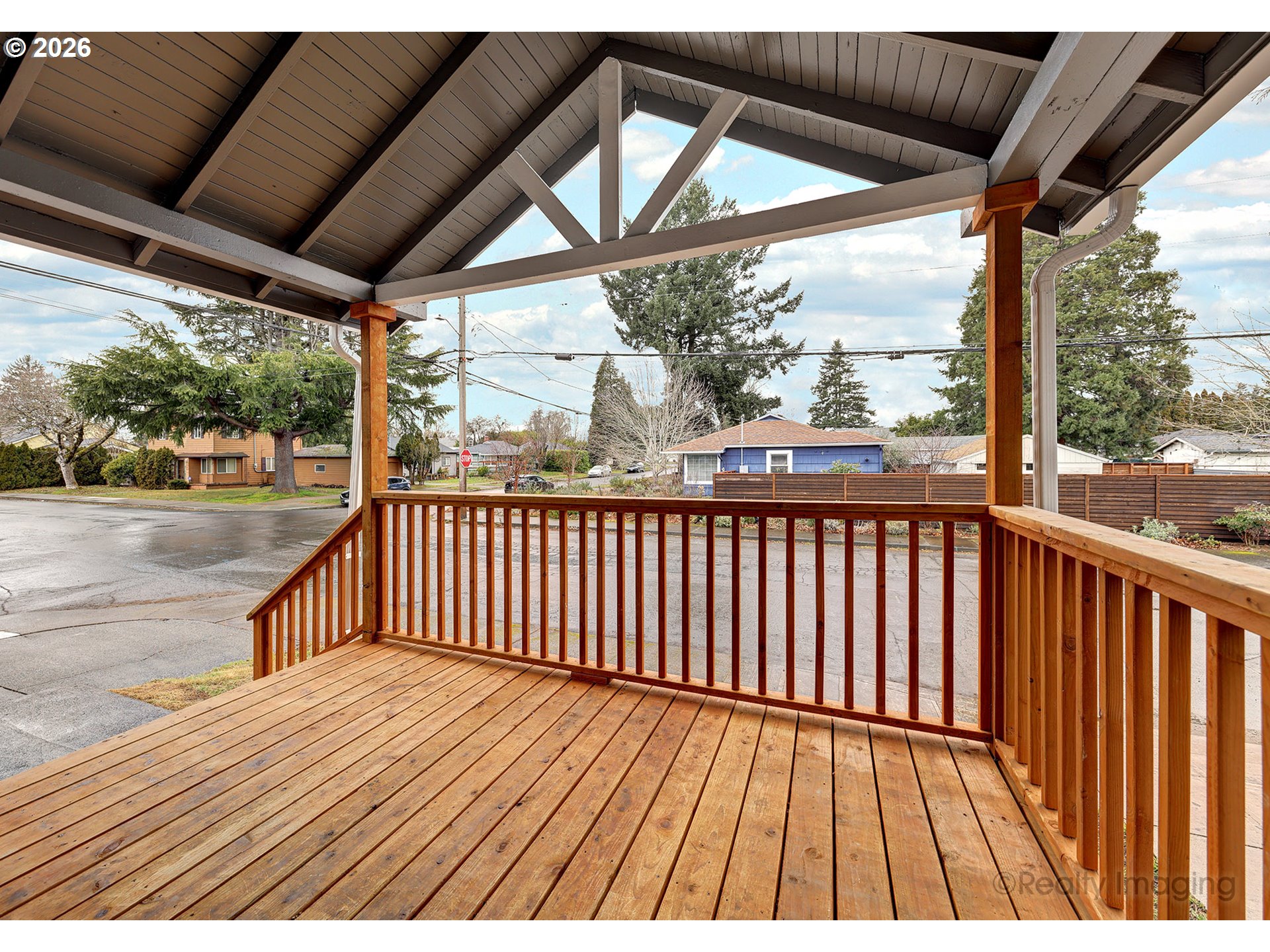 9004 Southeast Claybourne Street Portland, OR 97266 - Photo 2 of 15 a view of balcony with wooden floor