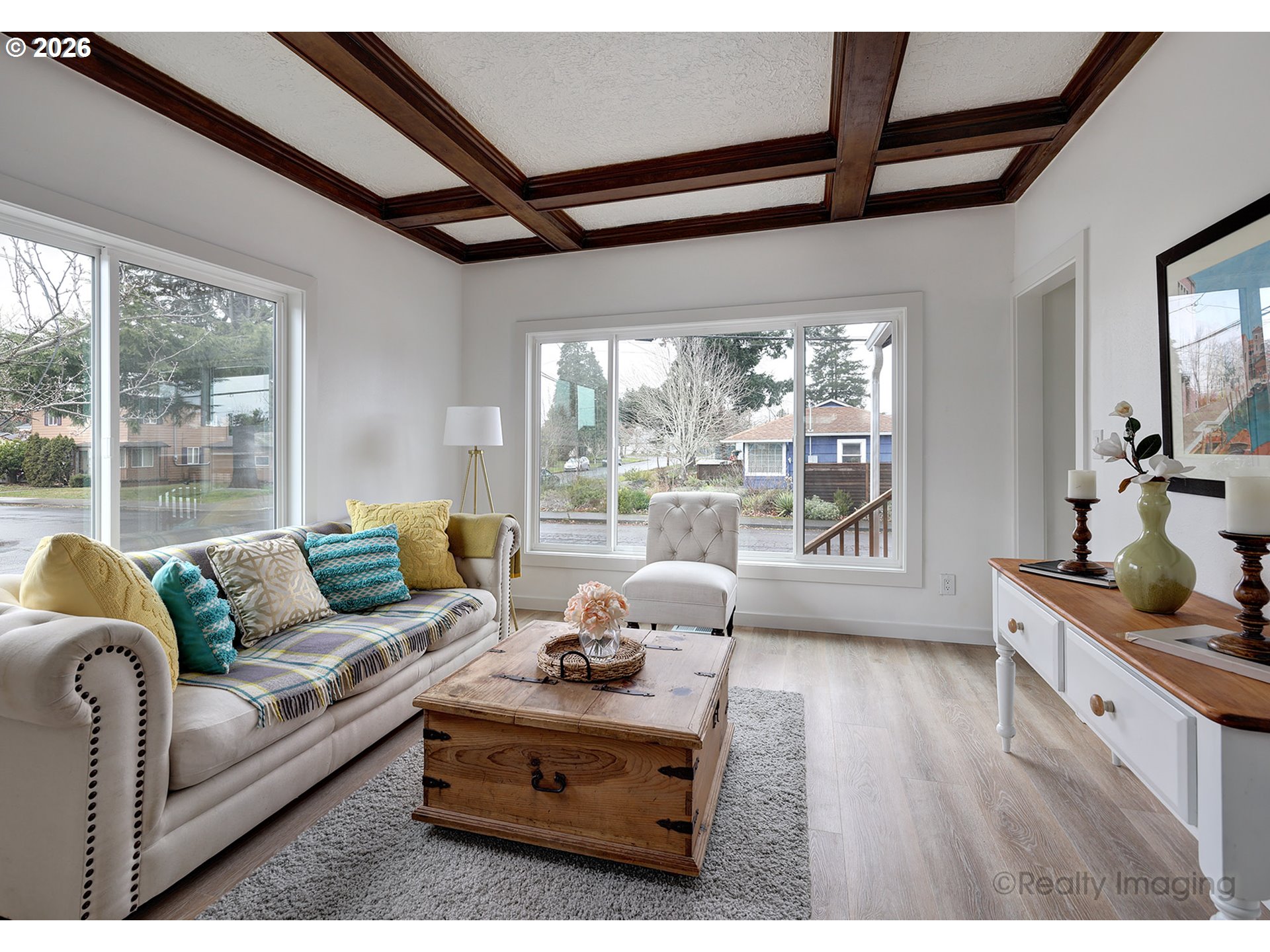 9004 Southeast Claybourne Street Portland, OR 97266 - Photo 4 of 15 a living room with furniture and a large window