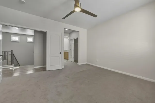 a view of a livingroom with a staircase