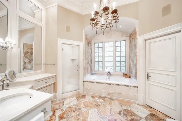 a living room with lots of furniture and a book shelf