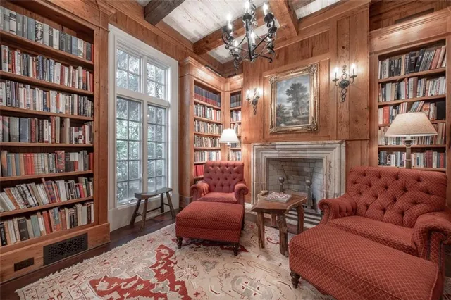 a room with furniture and a flat screen tv